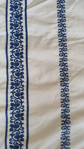 Colcha de tela con rayas azules