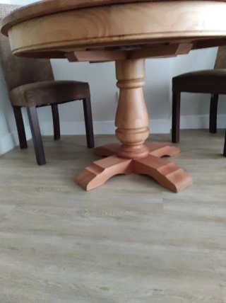 Mesa de comedor redonda de madera