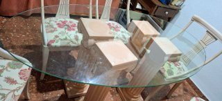 Mesa cristal ovalada 4 columnas terracota