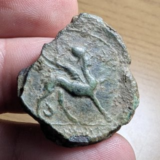 Moneda íbera Castulo 120-80 a.C. "cospel partido"