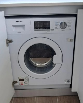 Lavadora Secadora Siemens iQ500 7/4 kg Integrada