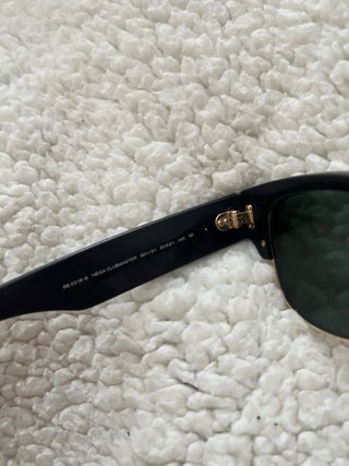 Gafas de sol Ray-Ban Clubmaster negras y doradas