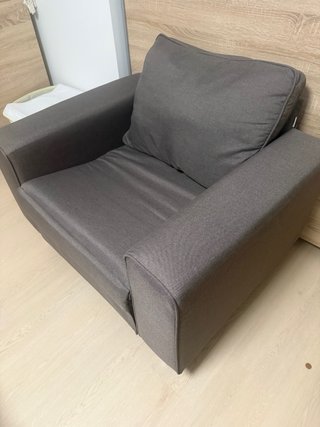Sillón de tela marron