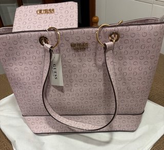 Bolso Guess rosa con monedero, sin estrenar .