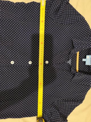 Blusa azul marino de puntos manga larga