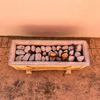 Vendo 5 Maceteros de piedra beige y marrón