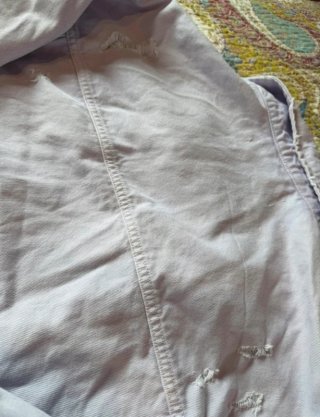 Chaqueta vaquera lila vintage de Zara.