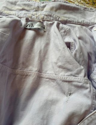 Chaqueta vaquera lila vintage de Zara.