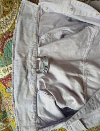 Chaqueta vaquera lila vintage de Zara.