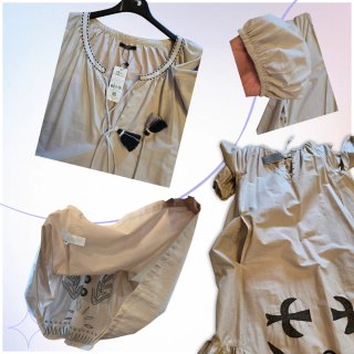 Vestido bege com bordado