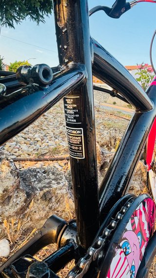Bicicleta infantil BTWIN rosa y negra