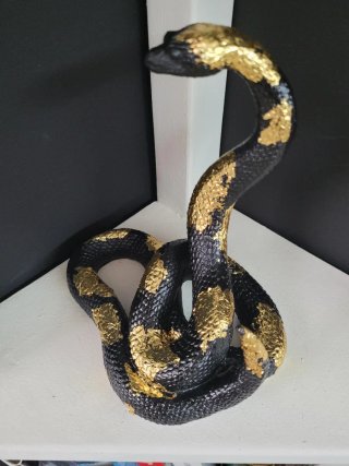 Serpente decorativo Art Déco nero e oro