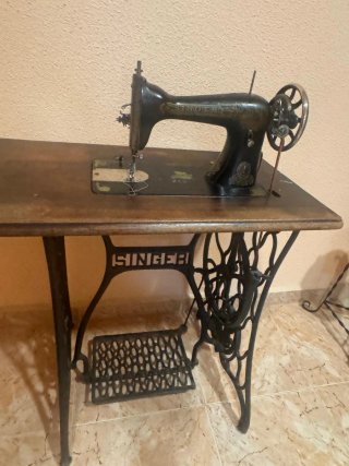 Máquina de coser Singer funcional
