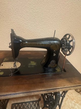 Máquina de coser Singer funcional