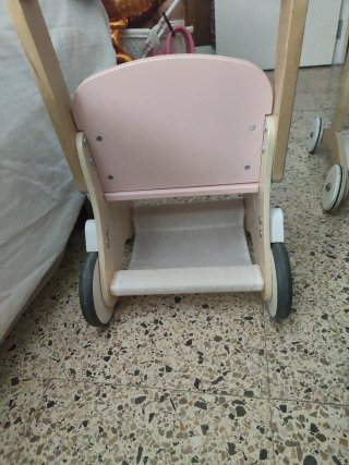 Cochecito de muñecas rosa