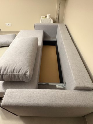 Sofá cama gris nuevo para dos personas