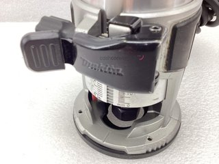 fresadora makita rt0702c