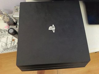 Consola PS4 Pro Negra Lo cambio por una ps5