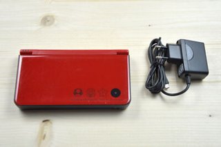 Nintendo DSi XL Ed. Mario 25 + Caricabatterie