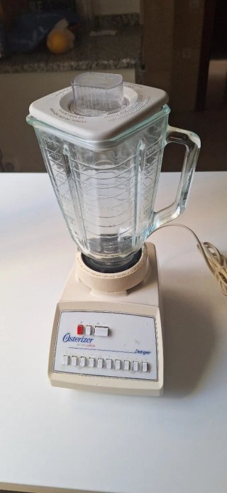 Batidora Oster con vasos mini