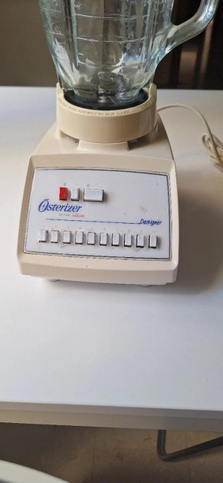 Batidora Oster con vasos mini