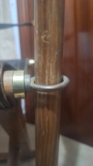 Dos sillas plegables vintage de cuero y dorado