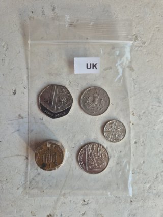 Monedas UK y USA curso legal