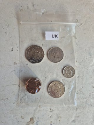 Monedas UK y USA curso legal