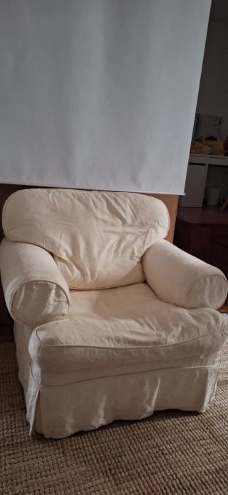 Sillón de plumas beige