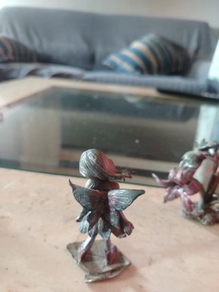 Figuras ninfa de plomo antiguas