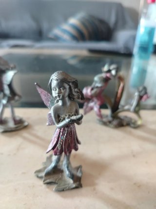 Figuras ninfa de plomo antiguas