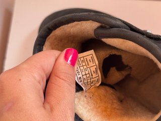 Ugg mini in pelle nera,foderati di lana di pecora