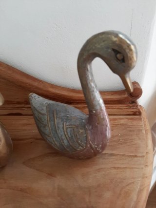 Pareja de patos de bronce