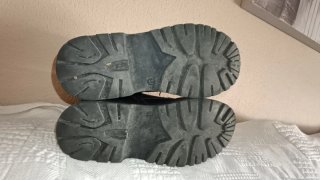 Botas negras con cordones y cremallera