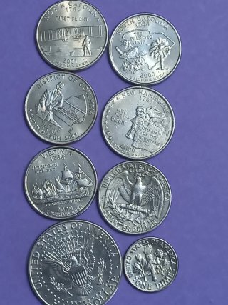 Monedas de Kennedy y Quarter Dólar y medio dólar