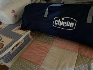Cuna portátil Chicco con colchón y sábanas