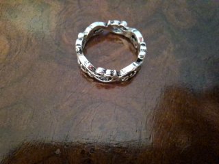 Anello metallo design floreale