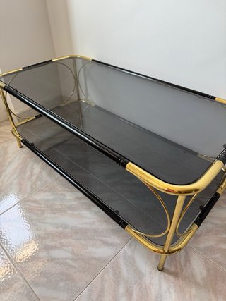 Mesa auxiliar cristal y metal dorado