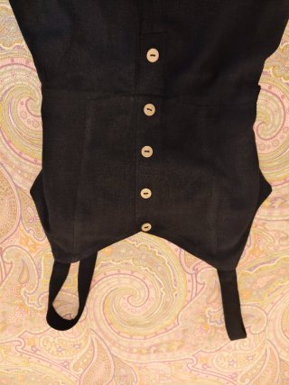 Mono negro con lazada espalda
