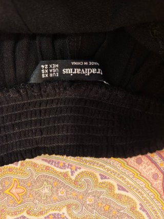 Mono negro con lazada espalda