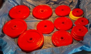 Discos de pesas rojos