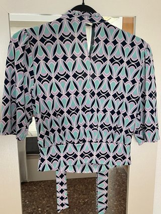 Elegante blusa media manga
