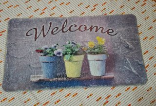 Tappeto Welcome con fiori in vaso