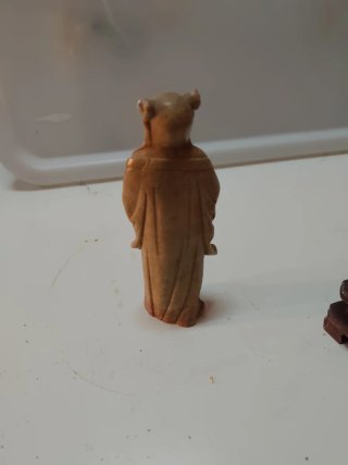 Statue cinesi in pietra beige/marrone