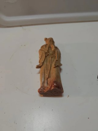 Statue cinesi in pietra beige/marrone