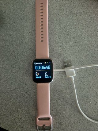 Reloj rosa y plateado