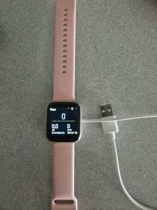 Reloj rosa y plateado