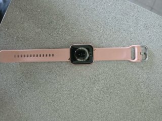 Reloj rosa y plateado