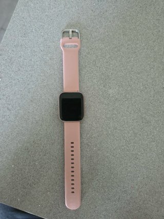 Reloj rosa y plateado