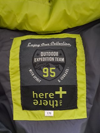 Chaqueta acolchada con capucha verde